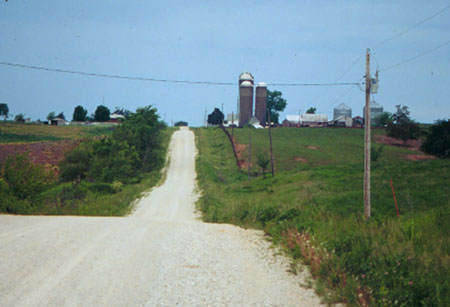 photo of sloping gravel road