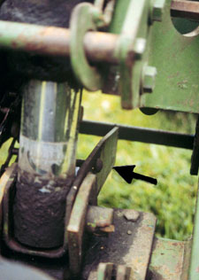 closeup photo of iron bracket with exposed sharp corner
