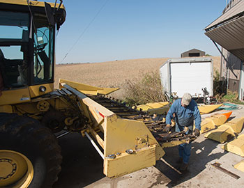 farmer fixing equipment