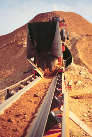 photo of conveyor belt next to gravel pile