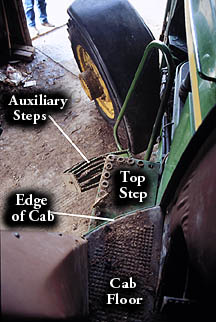 Photo 2: photo of the auxiliary steps, edge of cab, top step and cab floor