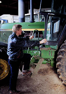 Photo 3: FACE investigator demonstrates "three point contact" with tractor