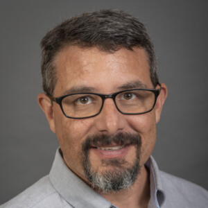 A portrait of Prof. Tom Peters of the Department of Occupational and Environmental Health at the University of Iowa College of Public Health.