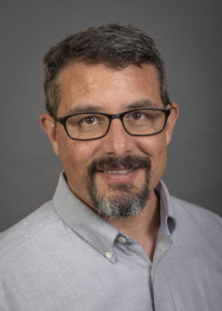 A portrait of Prof. Tom Peters of the Department of Occupational and Environmental Health at the University of Iowa College of Public Health.