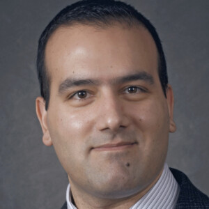 A portrait of George Wehby of the Department of Health Management and Policy at the University of Iowa College of Public Health.
