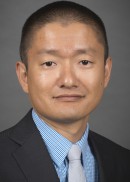 A portrait of Prof. Xi Zhu of the Department of Health Management and Policy at the University of Iowa College of Public Health.