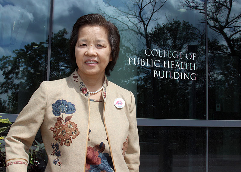 Visiting professor Naowarut Charoenca studies tobacco use and control in her home country of Thailand