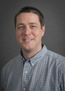 Portrait of Prof. Jacob Oleson of the Department of Biostatistics at the University of Iowa College of Public Health.