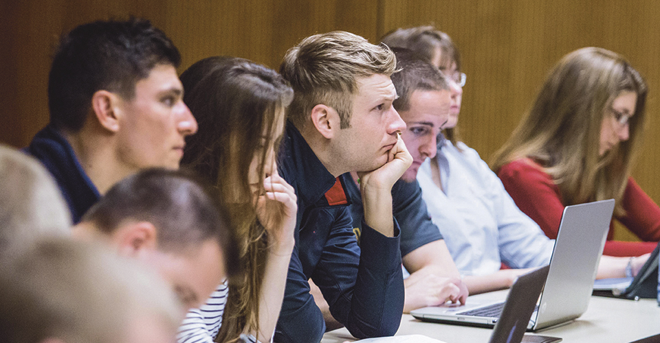 University of Iowa College of Public Health Epidemiology students listen during a lecture.