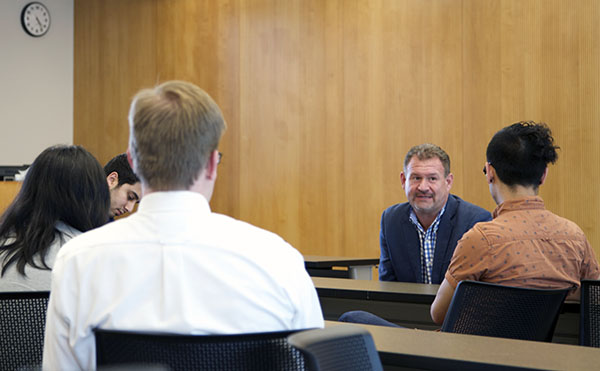 photo of L. Casey Chosewood talking to students