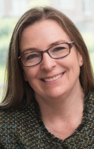 A portrait of Corinne Peek-Asa, Associate Dean for Research and Professor of Occupational and Environmental Health at the University of Iowa College of Public Health.