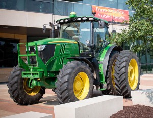 A tractor on display outside of the College of Public Health.