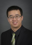 A portrait of Lyu Wei of the Department of Health Management and Policy in the College of Public Health at the University of Iowa.