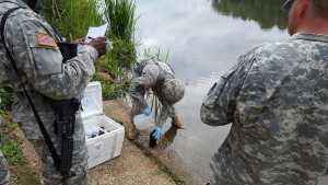 Members of the 926 Medical Detachment (PM) conducting water testing