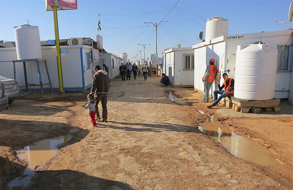 A muddy street in Zaatari refugee camp