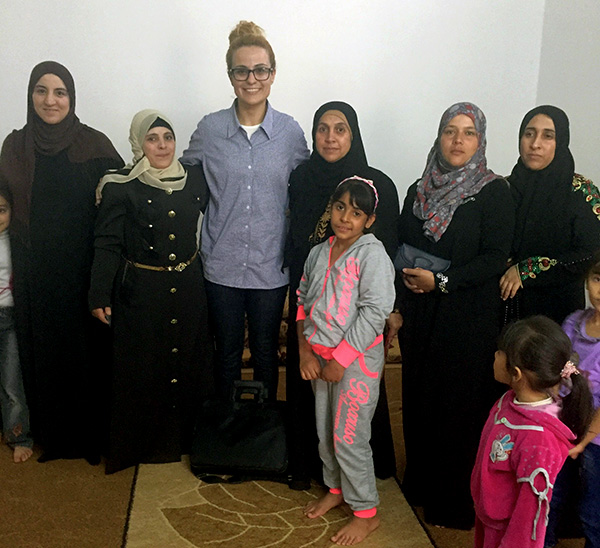 Tala Al-Rousan meeting with women and children refugees