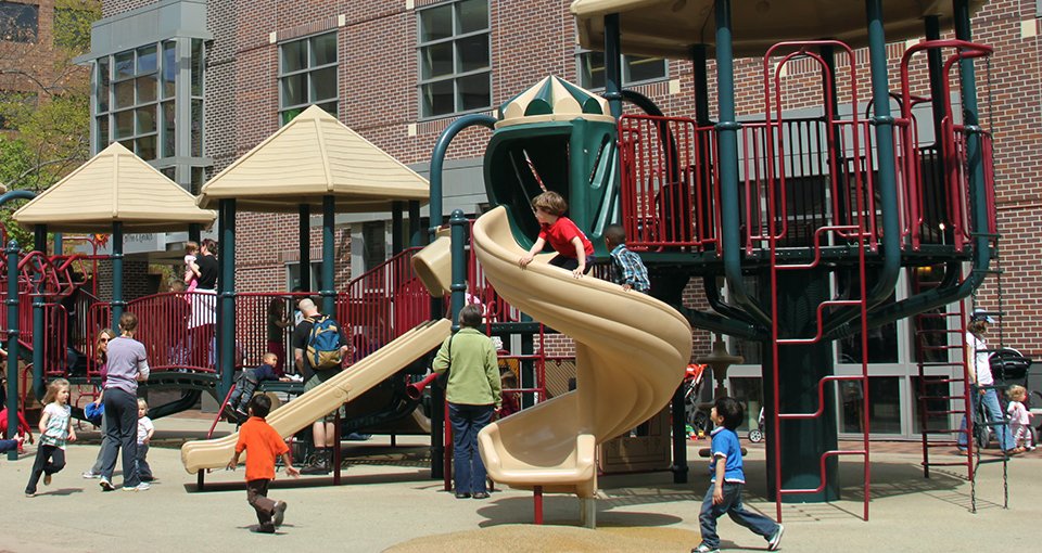 INVEST Health (children playing on play structure)