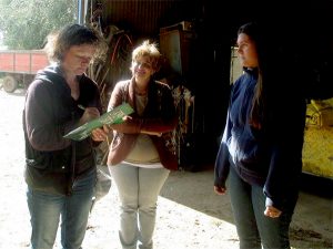 Dr. Janssen talks with Nora and her daughter Jasmina. Their family operates a small diversified farm in Sante Fe province, Argentia