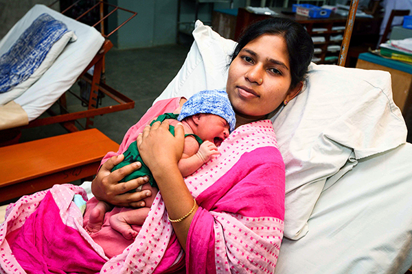 Atifa Begum with her new born baby at LAMB hospital. 