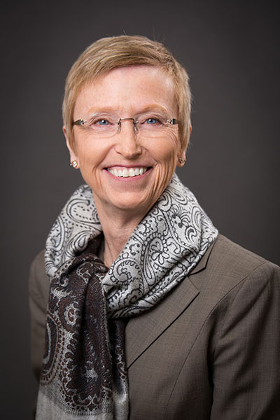 A portrait of Elizabeth "Betsy" Chrischilles of the Department of Epidemiology at the University of Iowa College of Public Health.