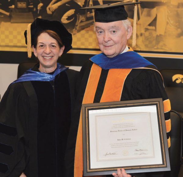 John W. Colloton receives an honorary degree from the University of Iowa College of Public Health in 2013.