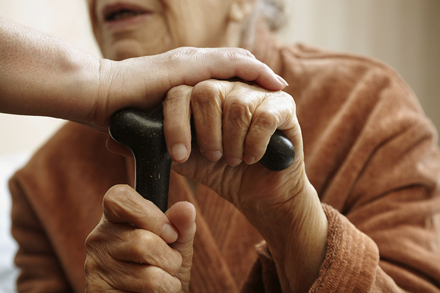 elderly man with cane