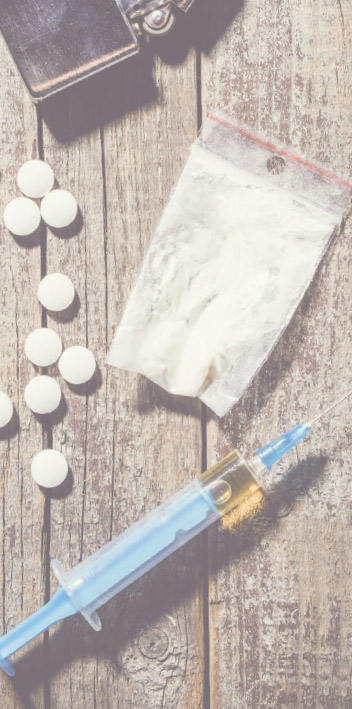 needle and opioid pills