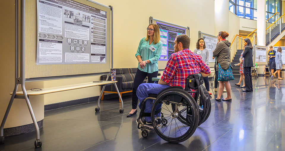 Students presenting posters at the 2017 HEAL Summit.