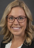 A portrait of Kelsie Ferstl of the Department of Health Management and Policy at the University of Iowa College of Public Health.
