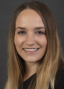 A portrait of Alexa Saco of the Department of Health Management and Policy at the University of Iowa College of Public Health.