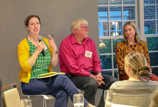 Maggie Chorazy presenting at an ASPPH panel session