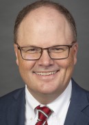 Portrait of Andrew Nugent of the Department of Health Management and Policy at the University of Iowa College of Public Health.