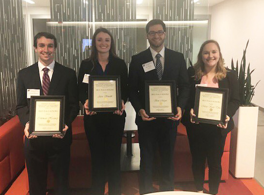 group photo of Iowa MHA students at U Kansas case competition