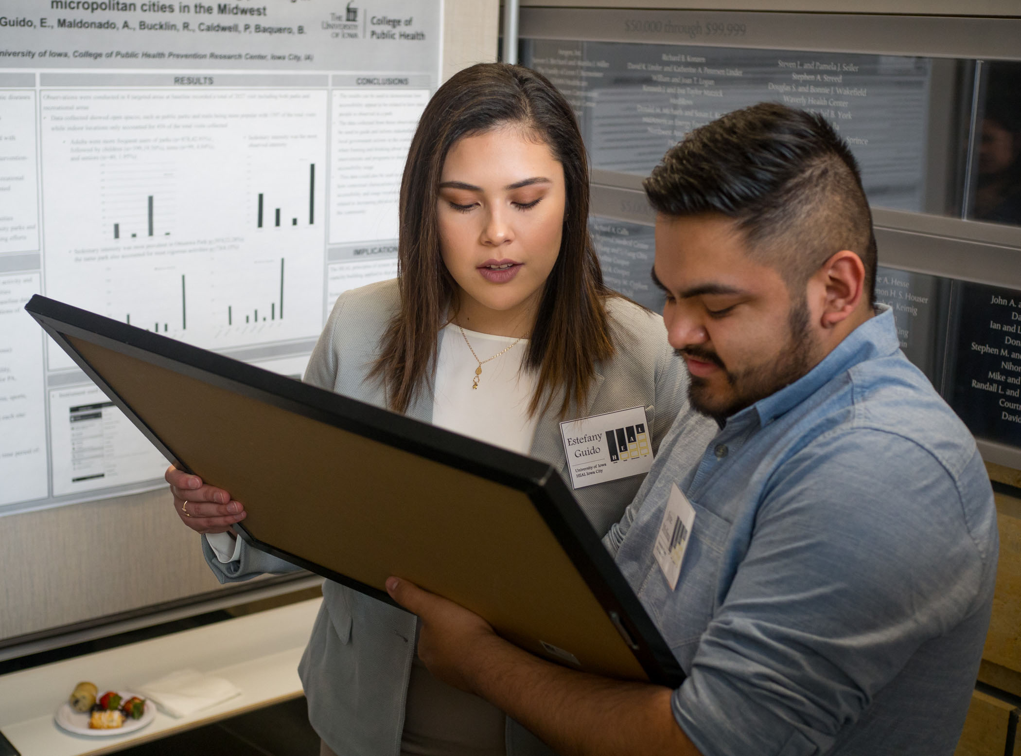 Students at a poster session at the Science of Health Equity Summit