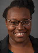 A portrait of Bikere Ikoba of the Department of Community and Behavioral Health at the University of Iowa College of Public Health.