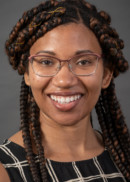 A portrait of Chelsea Hicks of the Department of Occupational and Environmental Health at the University of Iowa College of Public Health.