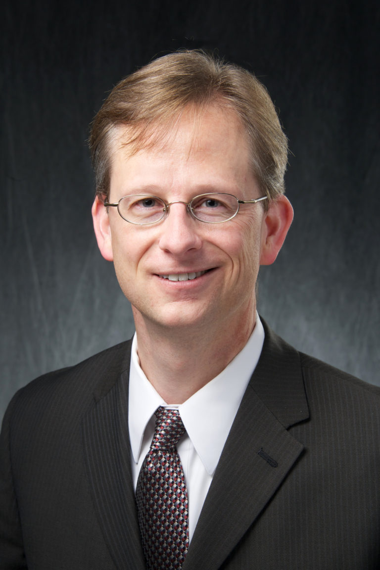 Portrait of Mark Vander Weg, professor and head of the Department of Community and Behavioral Health at the University of Iowa College of Public Health.