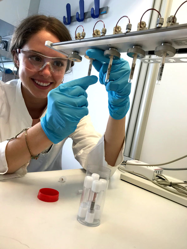 College of Public Health undergraduate student working in the laboratory