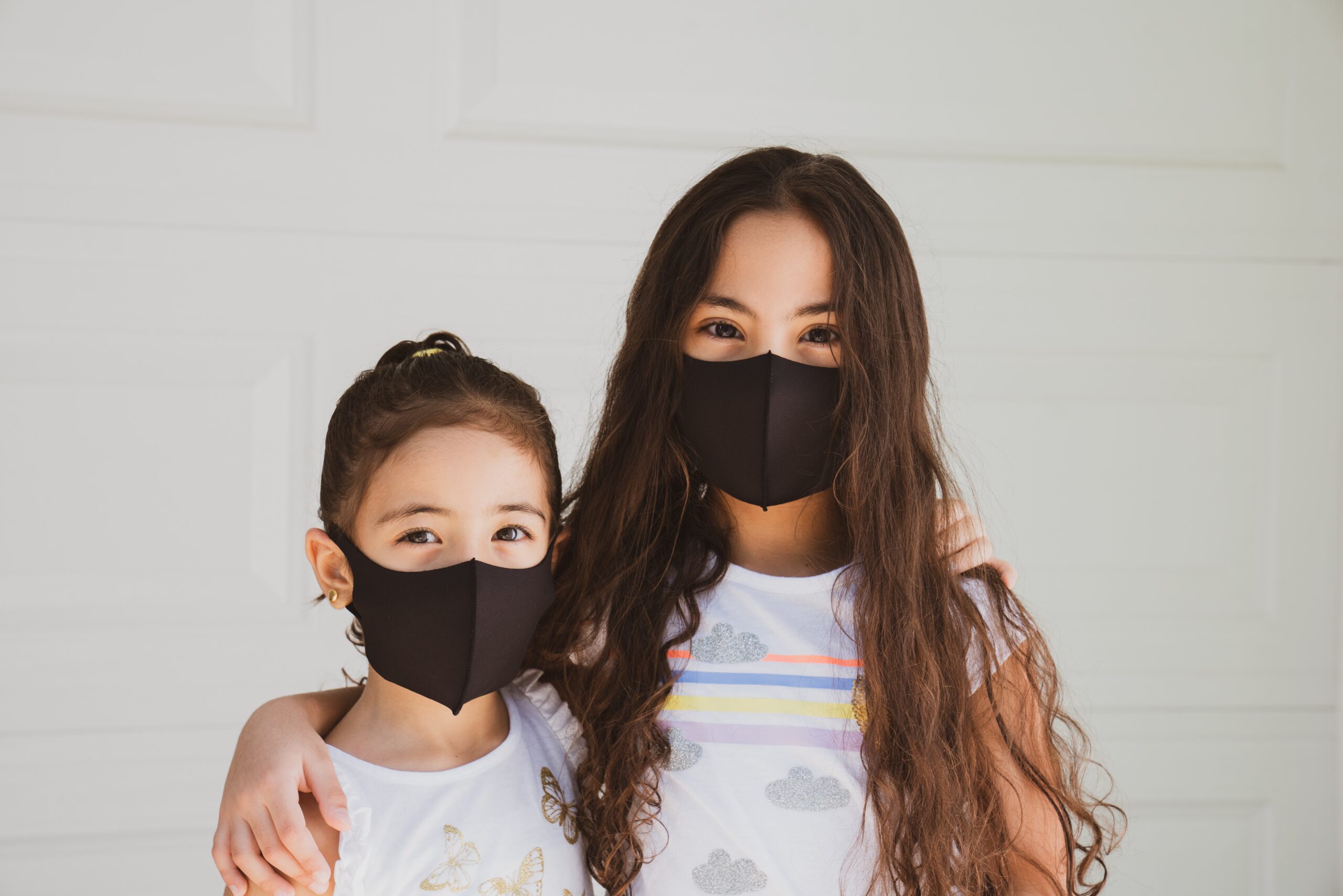 Parent and child with masks