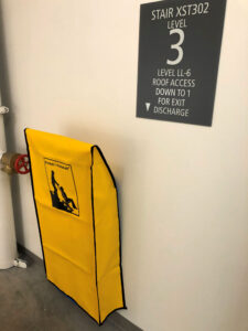 Image of the Evac Chair in the third-floor central stairwell of the College of Public Health Building