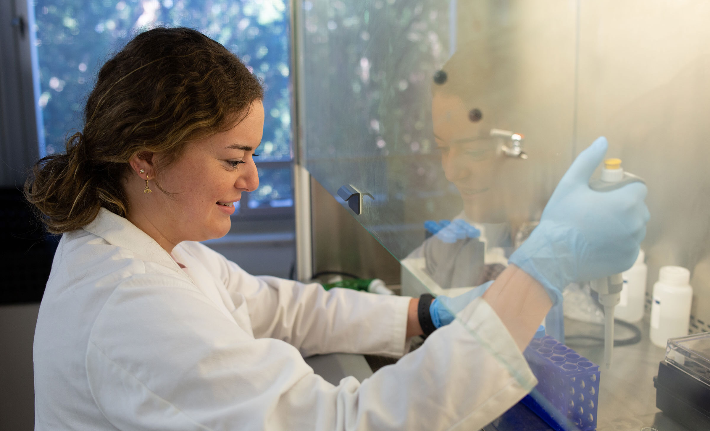 Occupational and Environmental Health student Lauren Barlow works in a CPH laboratory.