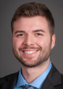 Portrait of Kameron Adams of the Department of Health Management and Policy at the University of Iowa College of Public Health.