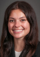 Portrait of Alexandra Colella of the Department of Health Management and Policy at the University of Iowa College of Public Health.