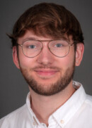 Portrait of Alex Barnett of the Department of Occupational and Environmental Health at the University of Iowa College of Public Health.