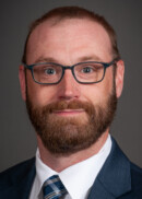 Portrait of Colin Farley of the Department of Health Management and Policy at the University of Iowa College of Public Health.