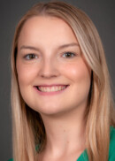 Portrait of Emily Huber of the Department of Occupational and Environmental Health at the University of Iowa College of Public Health.