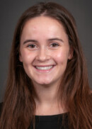 Portrait of Meredith Malloy of the Department of Health Management and Policy at the University of Iowa College of Public Health.