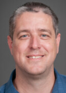 Portrait of Prof. Jacob Oleson of the Department of Biostatistics at the University of Iowa College of Public Health.