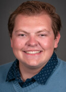 Portrait of Evan Weightman of the Department of Health Management and Policy at the University of Iowa College of Public Health.