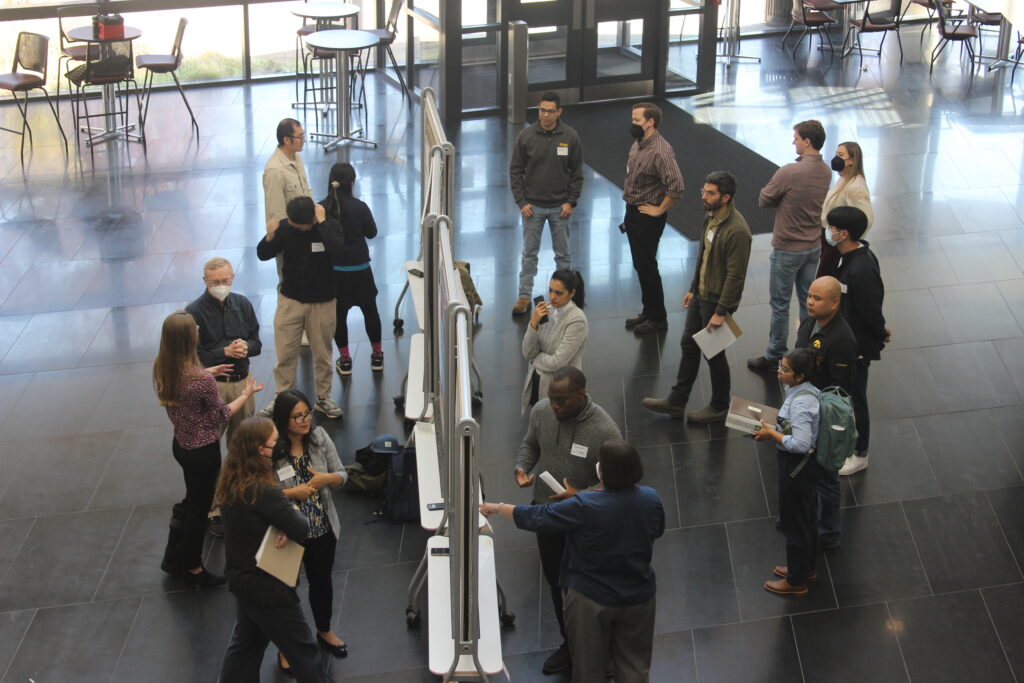 overhead view of Research Week 2022  poster presenters in the CPHB atrium